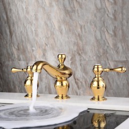 Rubinetto per lavabo dorato...